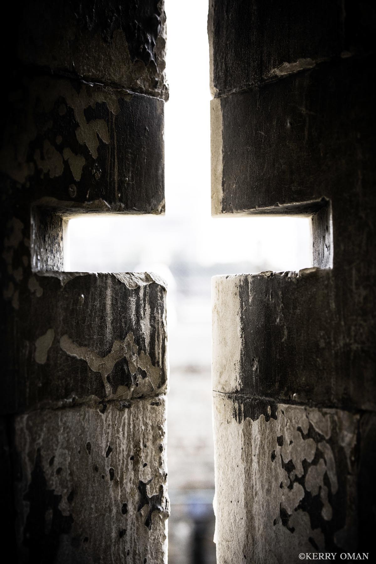 Watchtower Cross Carved into thick stone walls, this narrow cross-shaped opening once served as a defensive lookout within the Tower of London...